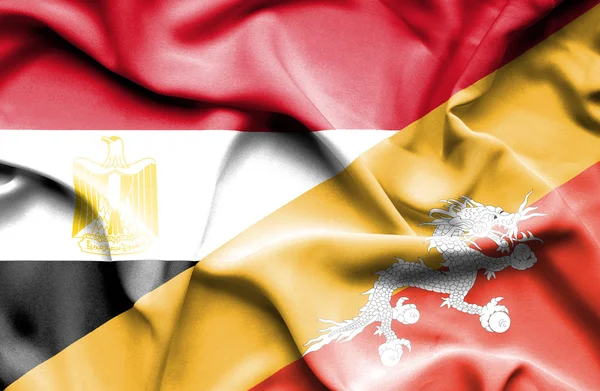 Waving flag of Bhutan and Egypt — Stock Photo, Image