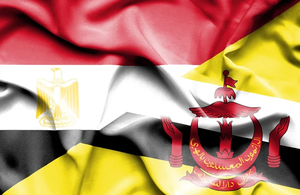 Waving flag of Brunei and Egypt — Stock Photo, Image