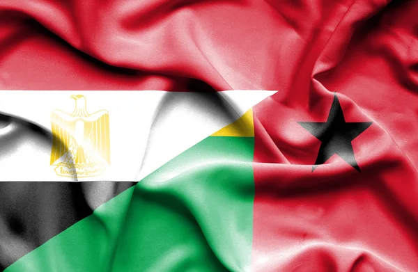 Waving flag of Guinea Bissau and Egypt — Stock Photo, Image