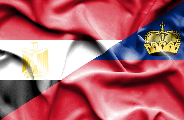 Waving flag of Lichtenstein and Egypt — Stock Photo, Image