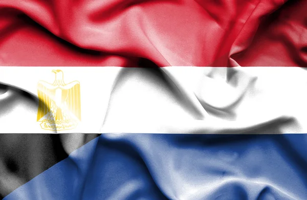 Waving flag of Netherlands and Egypt — Stock Photo, Image