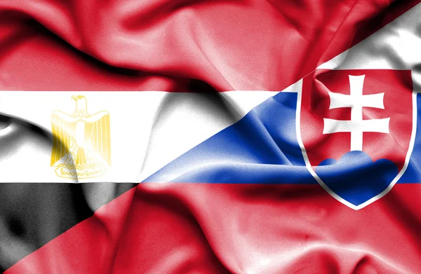 Waving flag of Slovakia and Egypt — Stock Photo, Image