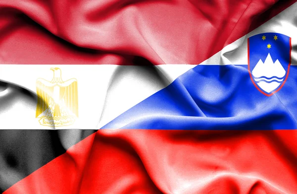 Waving flag of Slovenia and Egypt — Stock Photo, Image