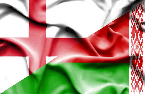 Fehéroroszország és Anglia hullámzó zászlaja — Stock Fotó