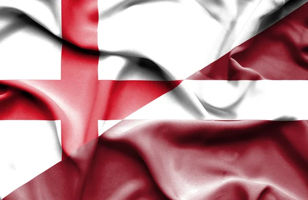 Waving flag of Latvia and England — Stock Photo, Image