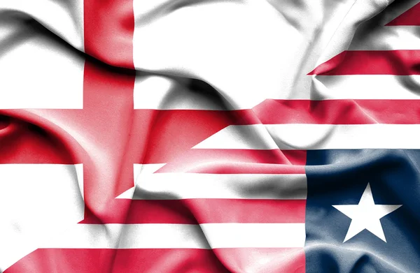 Ondeando la bandera de Liberia e Inglaterra —  Fotos de Stock