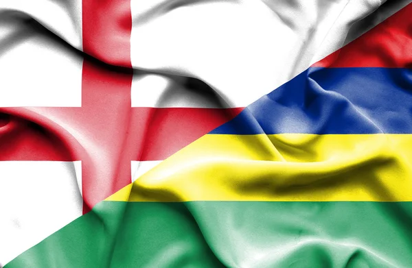 Wapperende vlag van Mauritius en Engeland — Stockfoto