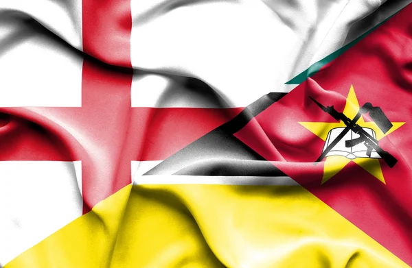 Viftande flagga Moçambique och England — Stockfoto