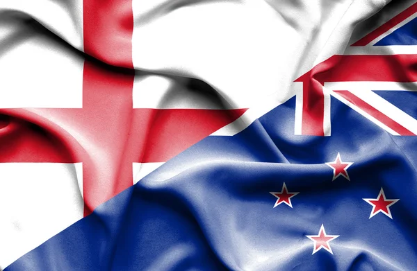 Waving flag of New Zealand and England — Stock Photo, Image