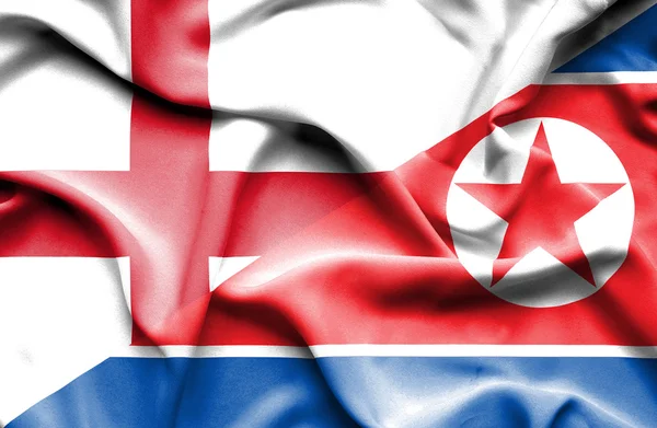 Nordkorea och England viftande flagga — Stockfoto