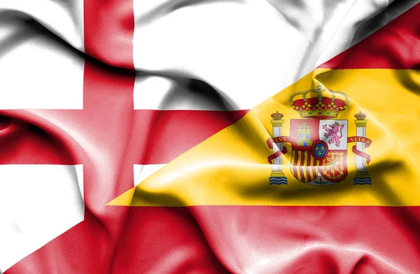 スペインおよびイギリスの旗を振っています。 — ストック写真