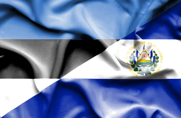 Waving flag of El Salvador and Estonia — Stock Photo, Image