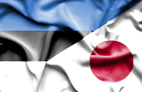 Waving flag of Japan and Estonia — Stock Photo, Image