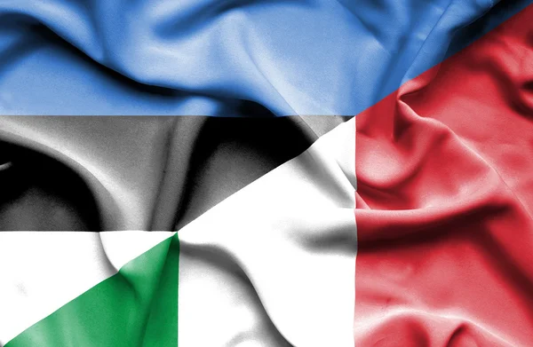 Waving flag of Italy and Estonia — Stock Photo, Image