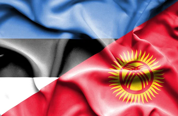 Waving flag of Kyrgyzstan and Estonia — Stock Photo, Image