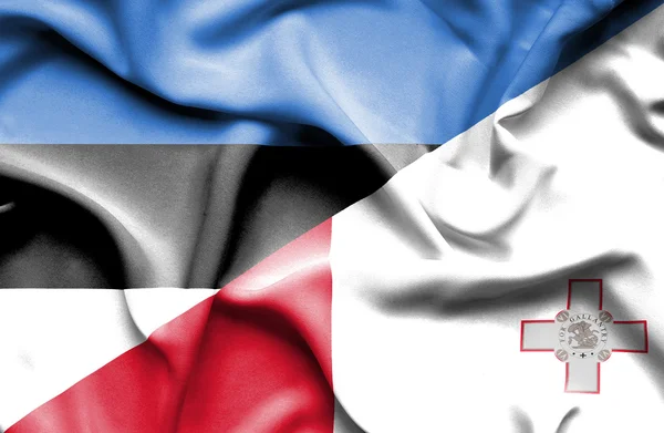Wapperende vlag van Malta en Estland — Stockfoto