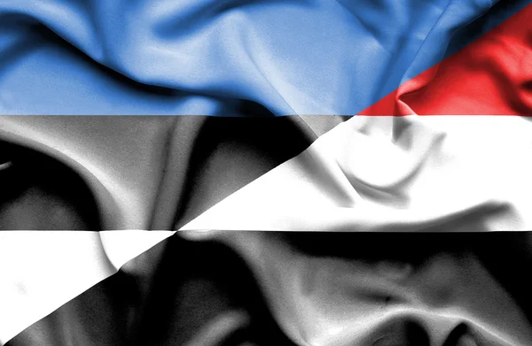 イエメン ・ エストニアの旗を振っています。 — ストック写真