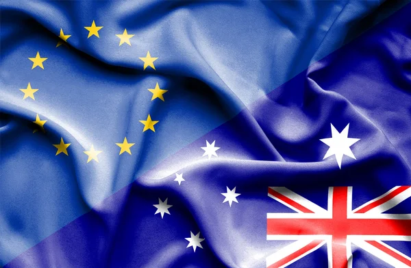 Flagge Australiens und der EU schwenken — Stockfoto