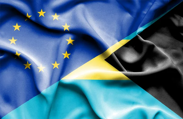 Размахивая флагом Багамских островов и ЕС — стоковое фото
