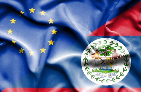 Belize ve AB bayrağı sallayarak — Stok fotoğraf