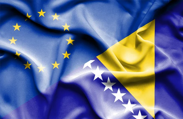 Vlající vlajka Bosny a Hercegoviny a eu — Stock fotografie
