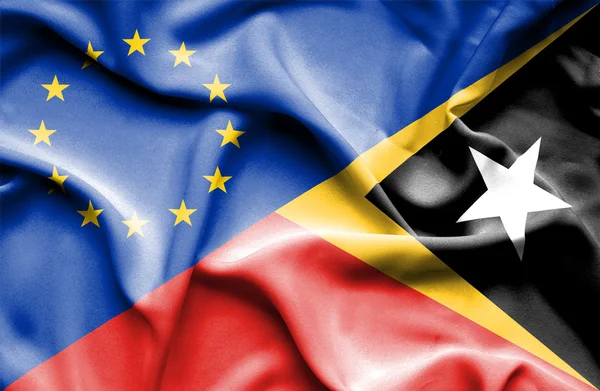 Waving flag of East Timor and EU — Stock Photo, Image