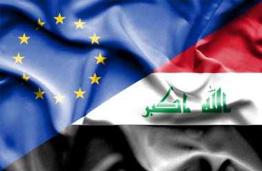 Irak ve AB bayrağı sallayarak