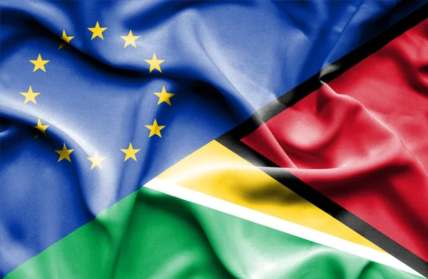 Waving flag of Guyana and EU — Stock Photo, Image
