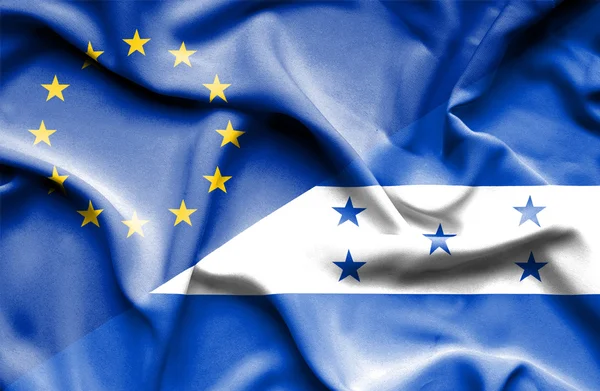 Waving flag of Honduras and EU — Stock Photo, Image
