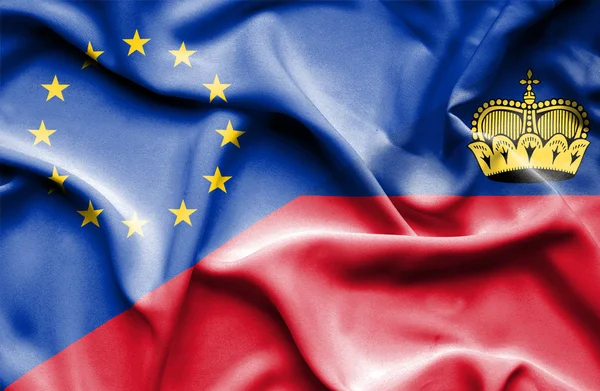Macha flagą lichtenstein i UE — Zdjęcie stockowe