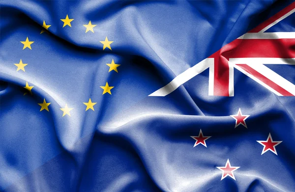 Waving flag of New Zealand and EU — Stock Photo, Image