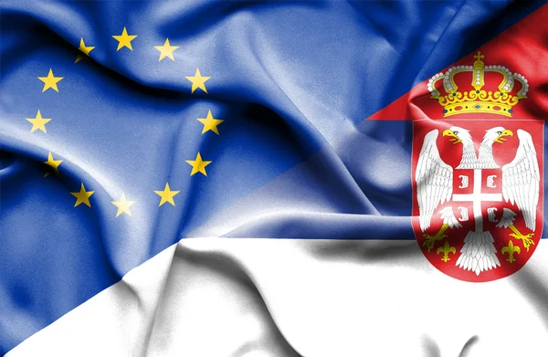 Bandera ondeante de Serbia y la UE —  Fotos de Stock