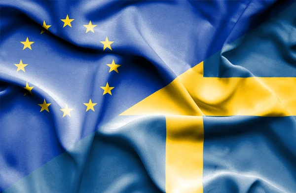 Wapperende vlag van Zweden en de eu — Stockfoto