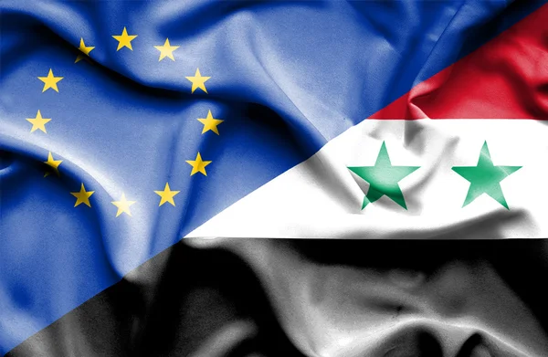 Waving flag of Syria and EU — Stock Photo, Image