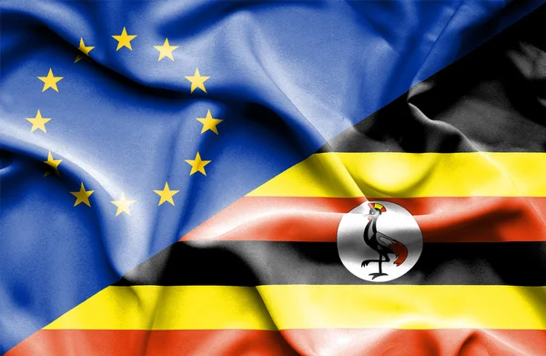 Uganda och eu viftande flagga — Stockfoto