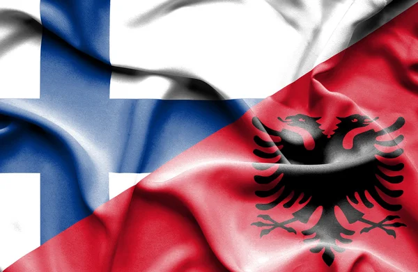 Bandera ondeante de Albania y Finlandia — Foto de Stock