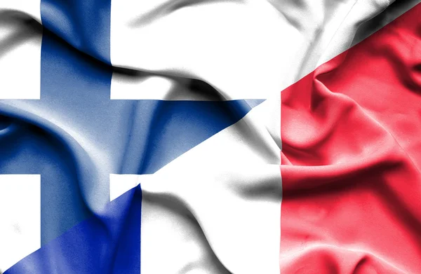 法国和芬兰的那飘扬的旗帜 — 图库照片