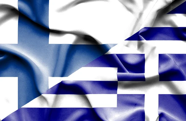 Κουνώντας τη σημαία της Ελλάδας και της Φινλανδίας — Φωτογραφία Αρχείου