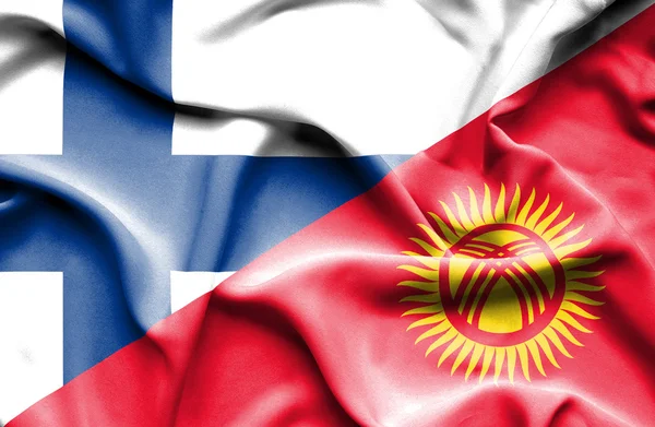 Bandera ondeante de Kirguistán y Finlandia — Foto de Stock
