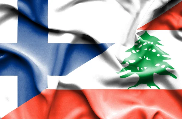 Waving flag of Lebanon and Finland — Stock Photo, Image