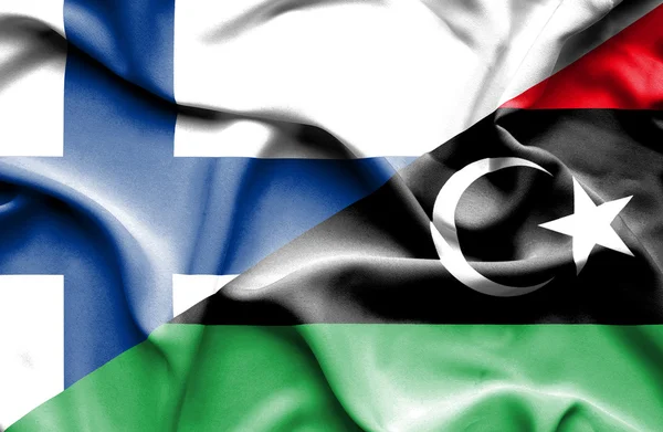 リビアとフィンランドの旗を振ってください。 — ストック写真