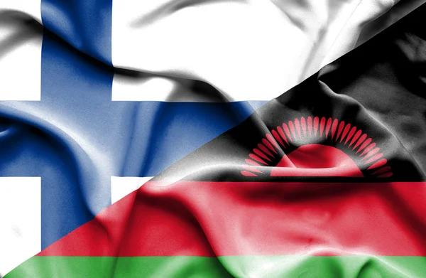 Ondeando la bandera de Malawi y Finlandia — Foto de Stock