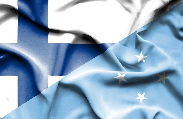 Waving flag of Micronesia and Finland — Stock Photo, Image