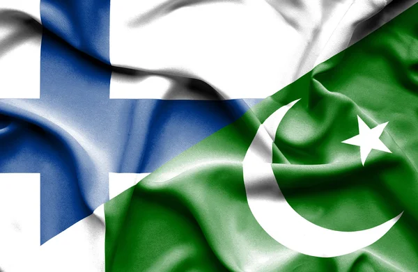 Bandiera sventolante di Pakistan e Finlandia — Foto Stock