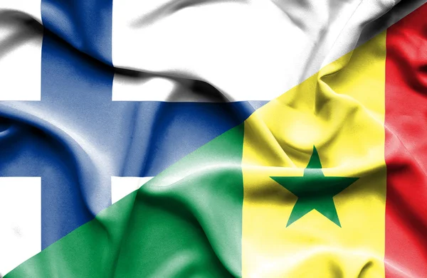 Bandeira ondulada do Senegal e da Finlândia — Fotografia de Stock