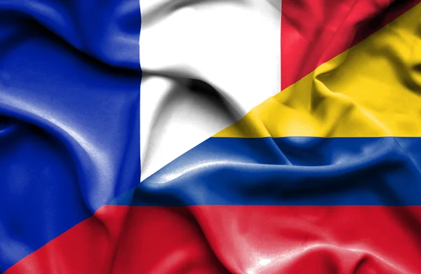 哥伦比亚和法国那飘扬的旗帜 — 图库照片