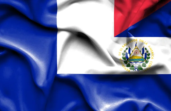 Wapperende vlag van El Salvador en Frankrijk — Stockfoto