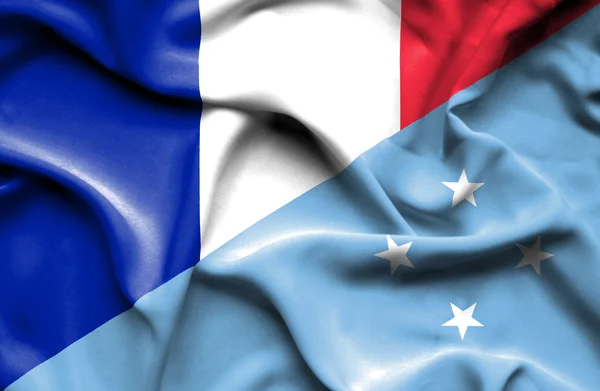 ミクロネシア、フランスの旗を振ってください。 — ストック写真
