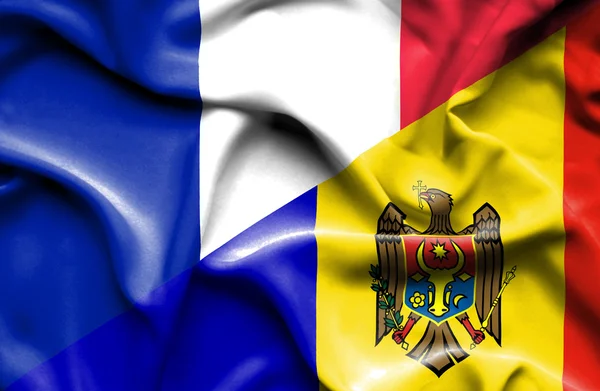 Bandera ondeante de Moldavia y Francia —  Fotos de Stock