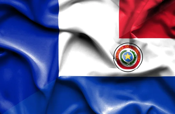 Waving flag of Paraguay and France — Stock Photo, Image